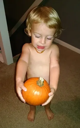 Blake holding a pumpkin