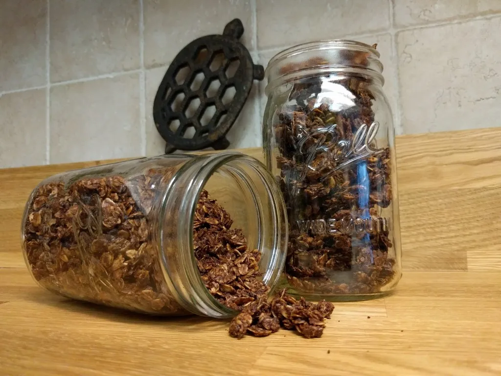 peanut butter chocolate granola in mason jars