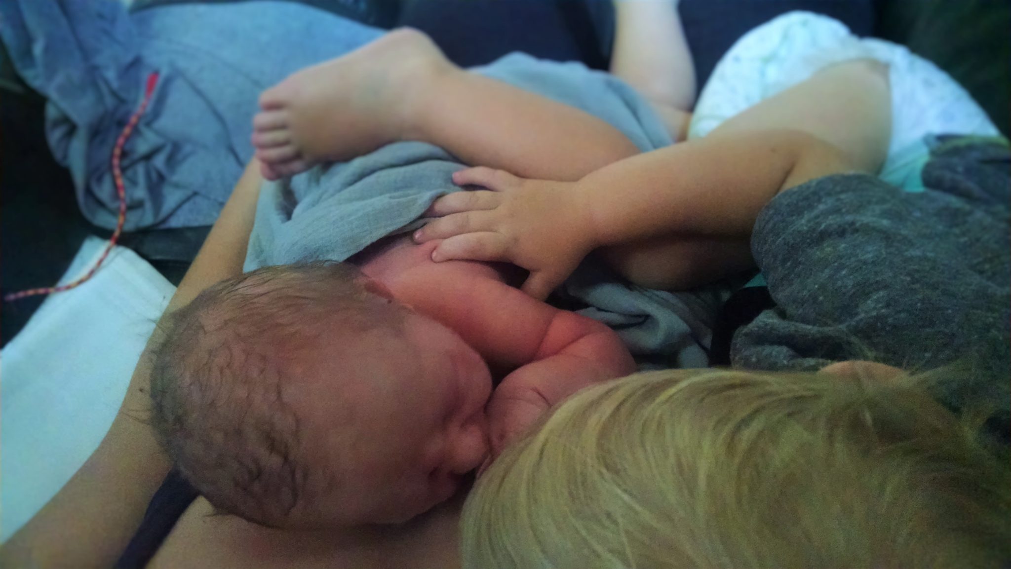 tandem nursing newborn and toddler